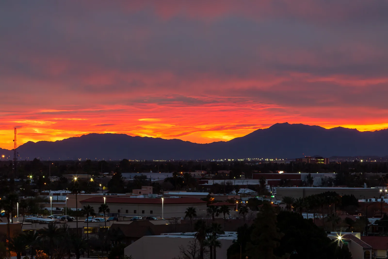Sunset over the Phoenix valley with mountains in silhouette