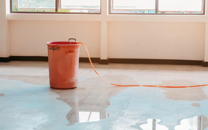 Concrete slab floor being assessed for a hidden leak